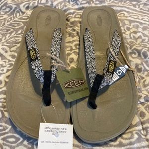 Keen flip flops, never worn.